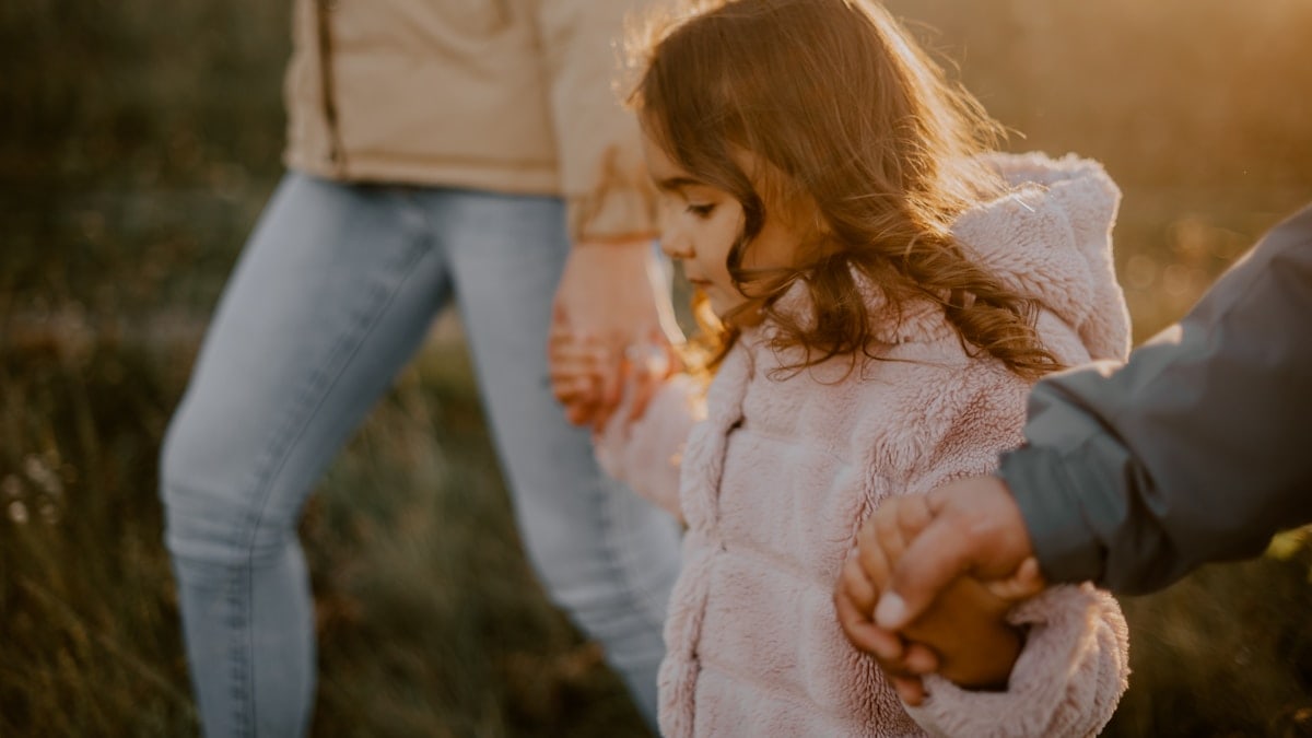a person holding a child